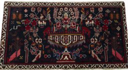 Surface texture of 2000s Shiraz rug with natural Wool and intricate pattern