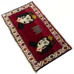 Corner detail of 2000s Shiraz rug showing border pattern and Wool pile
