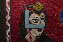 Backside of handmade 2000s Shiraz rug showing knot structure and weave density