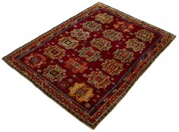 Corner detail of 2000s Shiraz rug showing border pattern and Wool pile