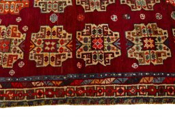 Close-up detail of 2000s Shiraz rug from Iran / Persia showing Wool weave
