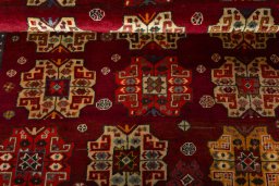 Full view of 2000s Shiraz rug from Iran / Persia, 185 × 136 cm in Red tones