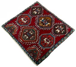Corner detail of 2000s Shiraz rug showing border pattern and Wool pile