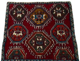 Surface texture of 2000s Shiraz rug with natural Wool and intricate pattern