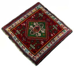 Corner detail of 2000s Shiraz rug showing border pattern and Wool pile