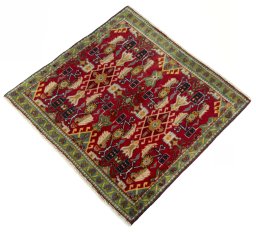 Corner detail of 2000s Shiraz rug showing border pattern and Wool pile