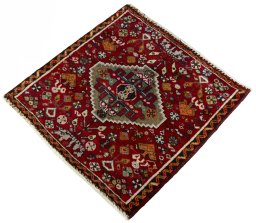 Corner detail of 2000s Shiraz rug showing border pattern and Wool pile