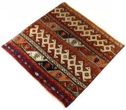 Corner detail of 2000s Shiraz rug showing border pattern and Wool pile