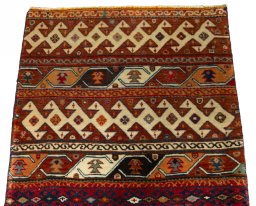 Surface texture of 2000s Shiraz rug with natural Wool and intricate pattern