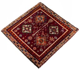 Corner detail of 2000s Shiraz rug showing border pattern and Wool pile