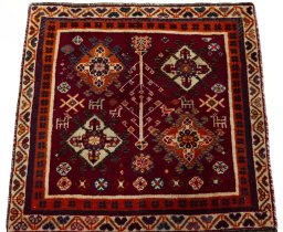 Surface texture of 2000s Shiraz rug with natural Wool and intricate pattern