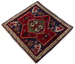 Corner detail of 2000s Shiraz rug showing border pattern and Wool pile