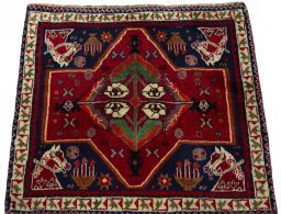 Surface texture of 2000s Shiraz rug with natural Wool and intricate pattern