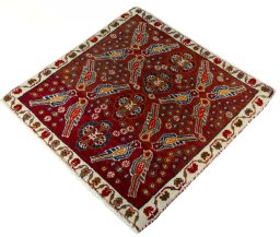 Corner detail of 2000s Shiraz rug showing border pattern and Wool pile