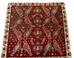 Surface texture of 2000s Shiraz rug with natural Wool and intricate pattern