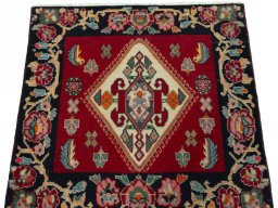 Surface texture of 2000s Shiraz rug with natural Wool and intricate pattern