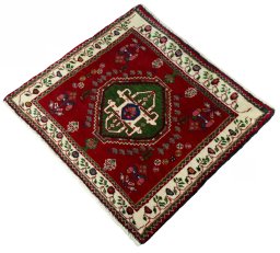 Corner detail of 2000s Shiraz rug showing border pattern and Wool pile