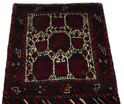 Surface texture of 2000s Shiraz rug with natural Wool and intricate pattern