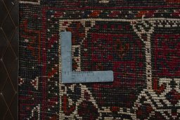Backside of handmade 2000s Shiraz rug showing knot structure and weave density