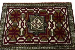 Surface texture of 2000s Shiraz rug with natural Wool and intricate pattern