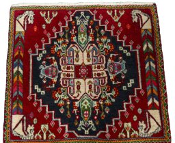 Surface texture of 2000s Shiraz rug with natural Wool and intricate pattern
