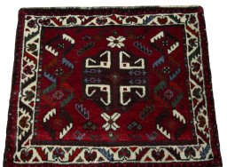Surface texture of 2000s Shiraz rug with natural Wool and intricate pattern