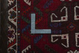 Backside of handmade 2000s Shiraz rug showing knot structure and weave density