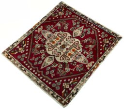 Corner detail of 2000s Shiraz rug showing border pattern and Wool pile