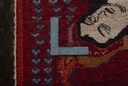 Backside of handmade 2000s Shiraz rug showing knot structure and weave density