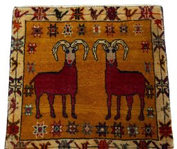 Surface texture of 2000s Shiraz rug with natural Wool and intricate pattern