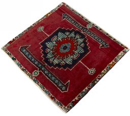 Corner detail of 2000s Shiraz rug showing border pattern and Wool pile