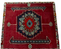 Surface texture of 2000s Shiraz rug with natural Wool and intricate pattern