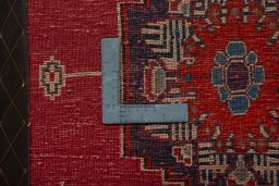 Backside of handmade 2000s Shiraz rug showing knot structure and weave density