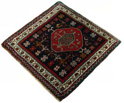 Corner detail of 2000s Shiraz rug showing border pattern and Wool pile