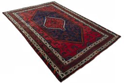 Close-up detail of 2000s Shiraz rug from Iran / Persia showing Wool weave