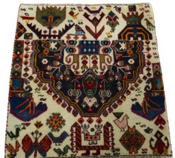 Surface texture of 2000s Shiraz rug with natural Wool and intricate pattern