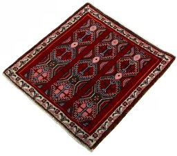 Corner detail of 2000s Shiraz rug showing border pattern and Wool pile