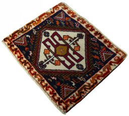 Corner detail of 2000s Shiraz rug showing border pattern and Wool pile