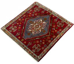 Corner detail of 2000s Shiraz rug showing border pattern and Wool pile