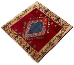 Corner detail of 2000s Shiraz rug showing border pattern and Wool pile