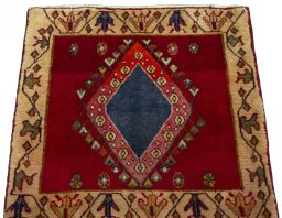Surface texture of 2000s Shiraz rug with natural Wool and intricate pattern
