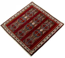 Corner detail of 2000s Shiraz rug showing border pattern and Wool pile