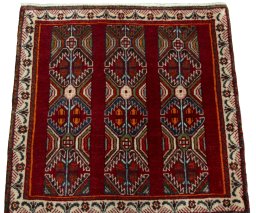 Surface texture of 2000s Shiraz rug with natural Wool and intricate pattern