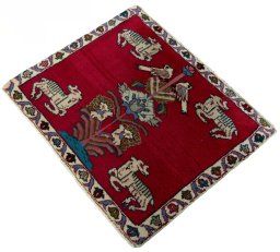Corner detail of 2000s Shiraz rug showing border pattern and Wool pile