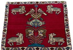 Surface texture of 2000s Shiraz rug with natural Wool and intricate pattern