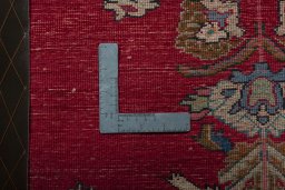Backside of handmade 2000s Shiraz rug showing knot structure and weave density