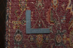 Backside of handmade 2000s Shiraz rug showing knot structure and weave density