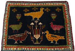 Surface texture of 2000s Shiraz rug with natural Wool and intricate pattern