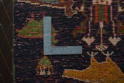 Backside of handmade 2000s Shiraz rug showing knot structure and weave density