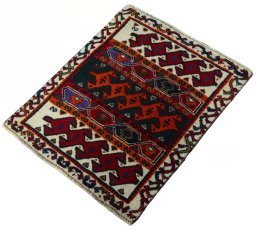 Corner detail of 2000s Shiraz rug showing border pattern and Wool pile